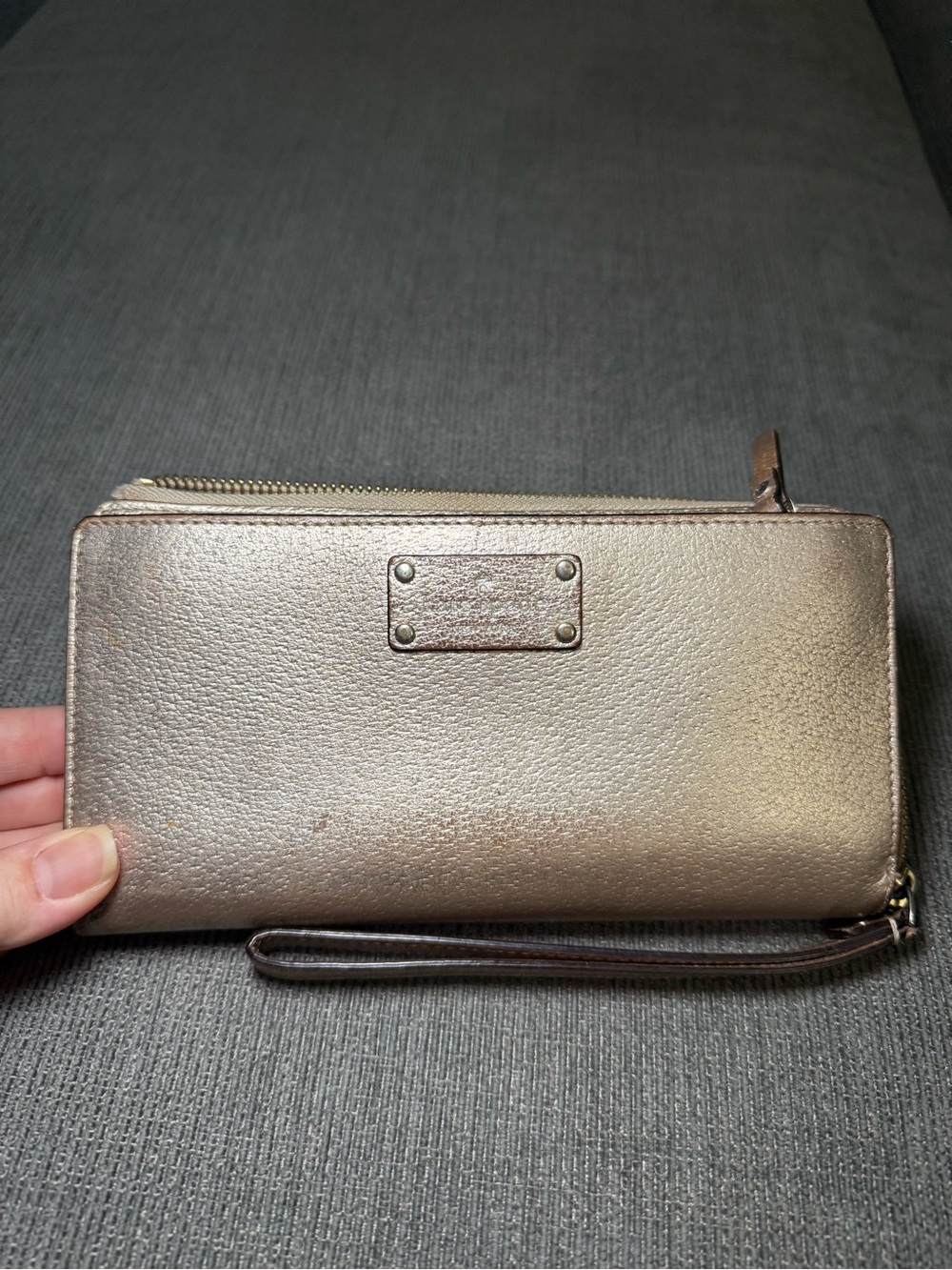 Kate spade Metallic Rose Gold Wristlet Wallet with Zip Closure